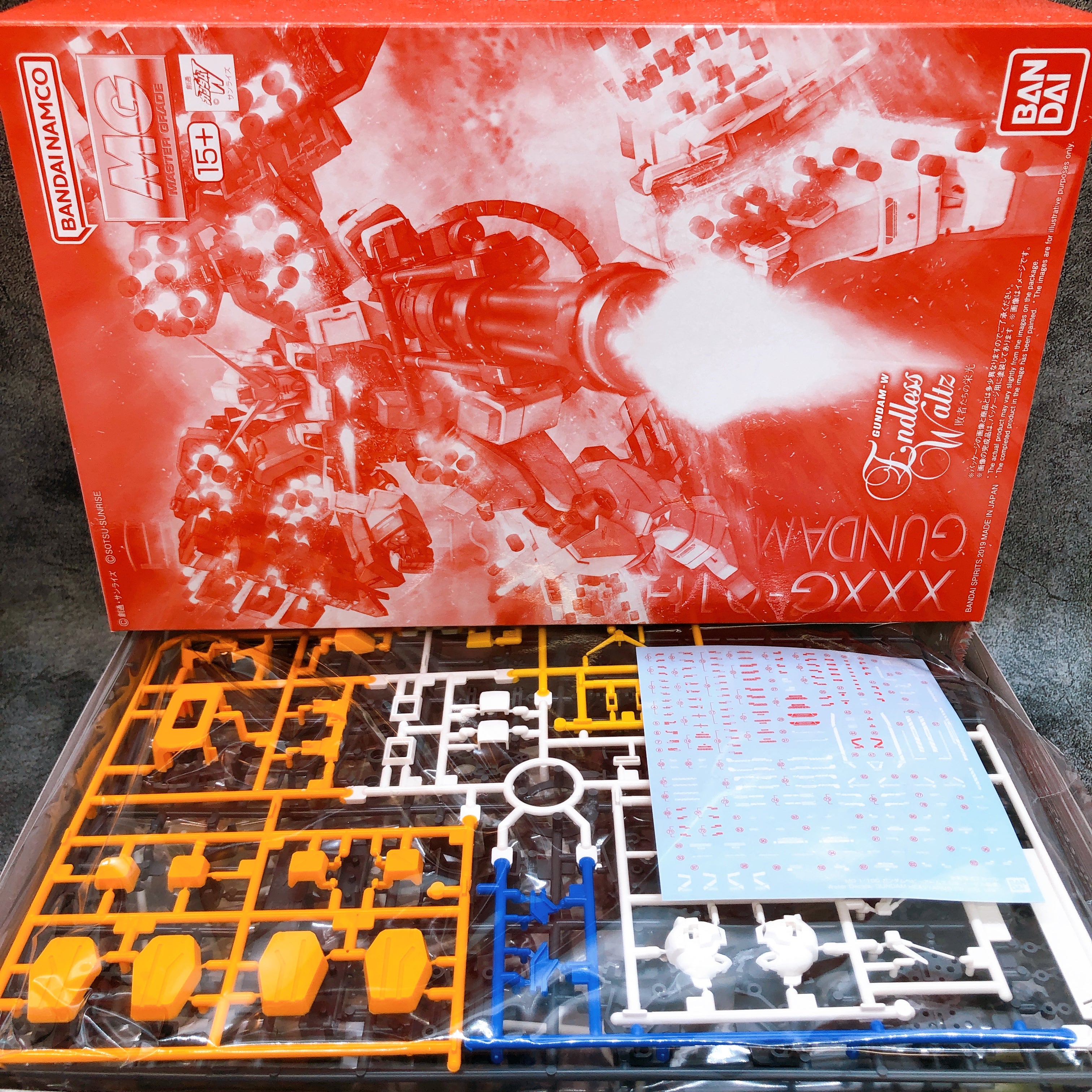 MG 1/100 Gundam Heavyarms EW IGEL UNIT XXXG-01H Model Kit 15+ Premium Bandai NEW